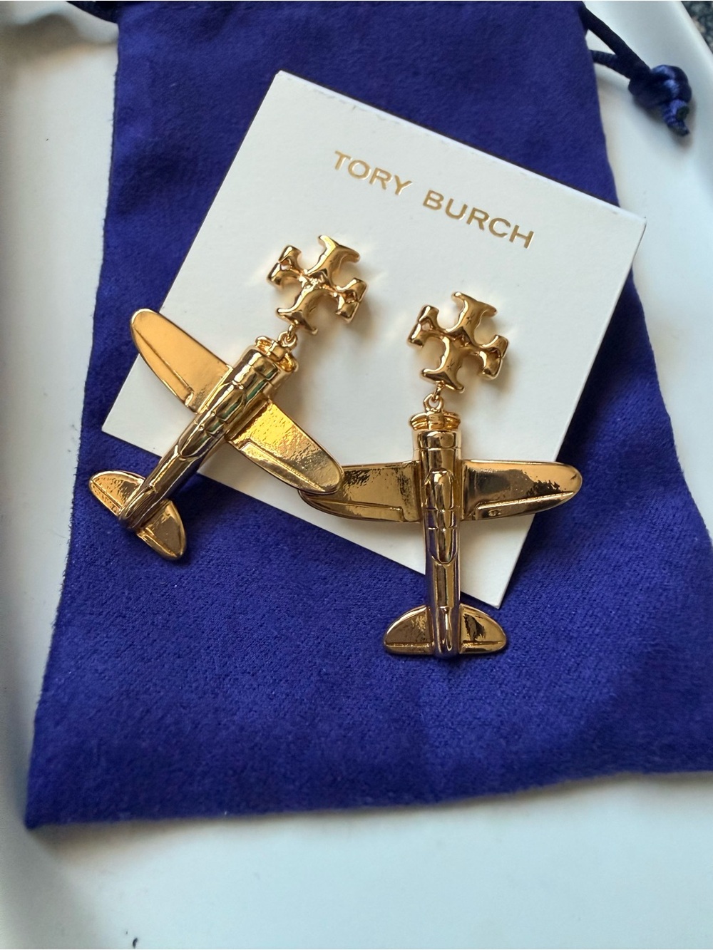 NEW Tory Burch Gold Tone Airplane Drop Earrings.